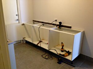 How to Fix Kitchen Cabinets to Wall