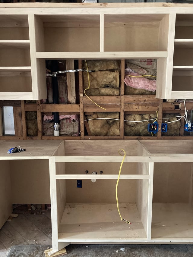 What is behind Kitchen Cabinets